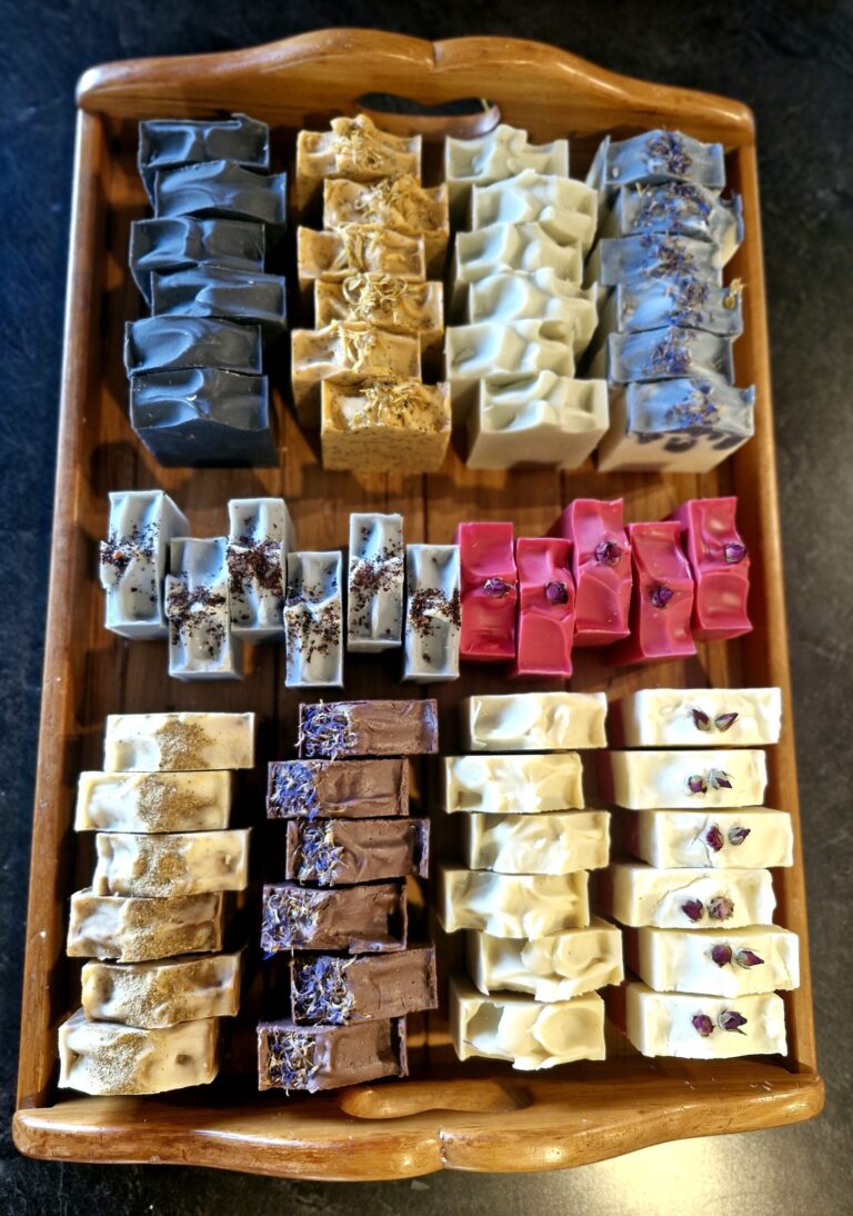 Tallow Soap by Fatglow - showing a tray of tallow soaps, all the beautiful natural colours highlighted, handmade in New Zealand by Fatglow