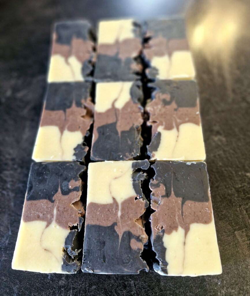 Dusky Clay handmade tallow soap by Fatglow with black, purple and white natural clay layers, made in New Zealand