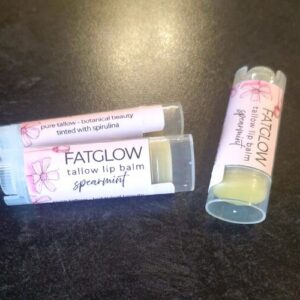 Fatglow Spearmint and Spirulina infused grass-fed tallow lip balm — a nutrient dense botanical lip treatment handmade in New Zealand