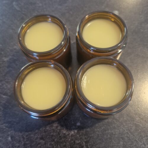 Grass-fed roman chamomile tallow balm in a glass jar, handmade in Taranaki, New Zealand for eczema and sensitive skin