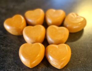 Small batch grass-fed tallow soap nz in winter colours including mustard, terracotta, grey and cream, handcrafted in Taranaki New Zealand